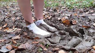 White socks in cold mud, myddy white socks, wet white socks, white socks stuck in mud (scene 593)