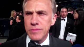 "How microphone-y is your microphone??" Christoph Waltz gets sassy on James Bond Spectre red carpet