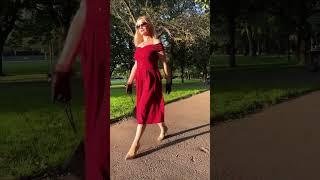 Olga Walking in the Park in a Red Dress and Seamed Stockings