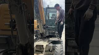 Repair of the boom base on a wheeled excavator.