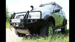 Установка силовых порогов на Mitsubishi Pajero Sport 2