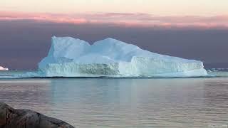 Large Iceberg breaking up and rolling around at 8x speed