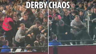 Moment huge brawl breaks out during West Ham vs Arsenal with punches thrown & fan knocked to ground