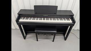 Yamaha clavinova CLP-525 digital piano and stool in satin black stock # 24304