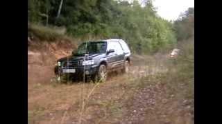 Two Subaru Forester XT with Outback 2.5 AT Off-Roading on the motocross track