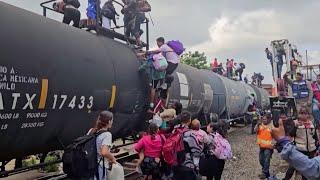 Migrant families climb train in Mexico, in trek to border  | VOA News