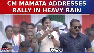 West Bengal CM Mamata Banerjee Addresses Large Gathering During Heavy Rain In Kolkata | English News