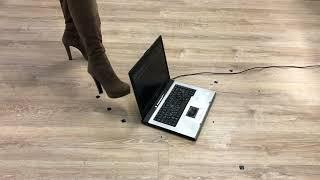 Girl trample and crush laptop with high heels boots