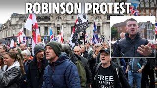 Thousands of Tommy Robinson supporters march through central London after far-right activist charged