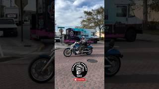 American Biker With Harley Davidson V-Rod On The Street