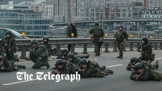 Ukraine war: Kyiv braces for battle as Russian tanks enter city