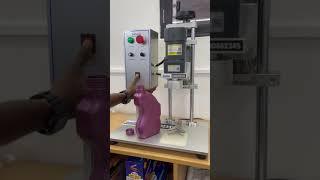 BOTTLE CAPPING MACHINE