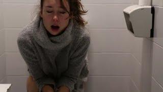 cute girl has diarrhea in public bathroom and gets embarrassed