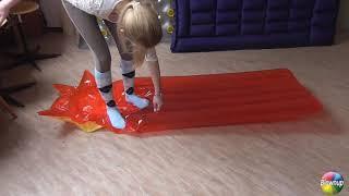 Girl deflates air mats