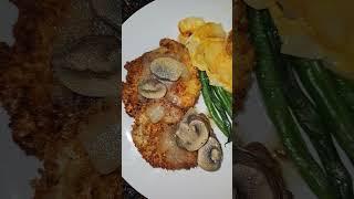 Pork Cutlet with Scalloped Potatoes and Green Beans.