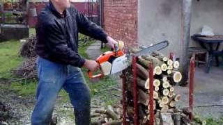 Cutting trees on stand with Stihl chainsaw