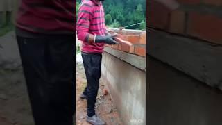 bricks#9"wall#in house#at#najar#construction#green