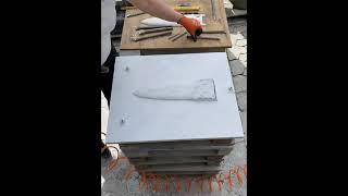 Carving an amphora-vase in marble.