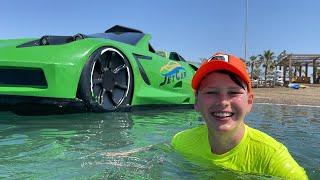 Ali ile JetCar kullanıyoruz kid ride a car in the sea