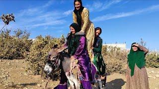 "Grandmother teaching donkey riding to the young women of the village, donkey riding for four people