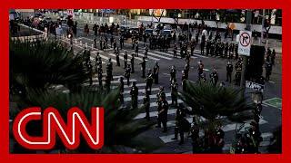 Over 200 arrested, 2 officers injured, businesses looted as LA braces for new night of protests