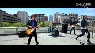 Shnobel Plays Guitar in a Music Video