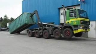 Hyvalift 40 Tons Hookloader on GINAF 10x4 lifting a heavy container