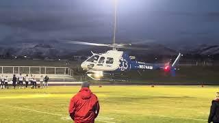 Helicopter landing at Soda  springs Idaho football field for homecoming Soda springs vs Wendell