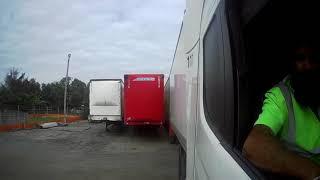 B double reversing into Unmarked trailer parking