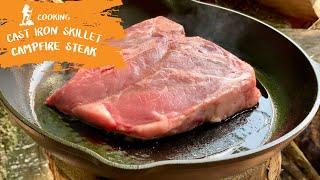 Giant steak on a campfire