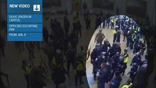 New video shows Doug Jensen being escorted out of Capitol on Jan. 6