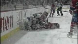 Cam Janssen runs over Carey Price