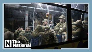Ukrainian soldiers leave Azovstal steel plant