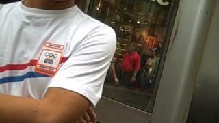 Pastor Ken on Oct 12 at  Mongkok Streets telling someone how much Jesus Loves Them!