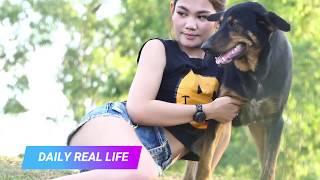 Lovely smart girl Playing Baby Cute Dogs On Rice Fields - Puppies Funny smart girl playing with dogs