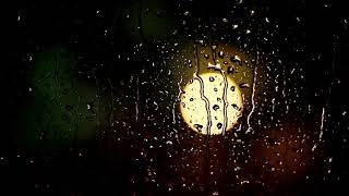 Тихий шум дождя за окном. The quiet sound of rain outside the window.