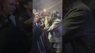 Travis Scott lets a fan perform with autotune 