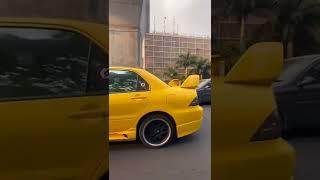 Vibrant and Dynamic: Yellow Mitsubishi Lancer on the Roads of Coimbatore, Tamil Nadu #evolution