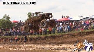 MEGA TRUCKS GO HUGE OFF DAM JUMP!