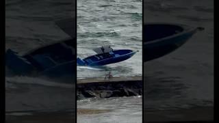 Midnight Express power boat cutting right through the Haulover Inlet. Filmed by my friend Scott