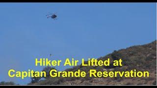 Helicopter Rescues and air lifts an injured hiker from Capitan Grande Reservation in Alpine CA