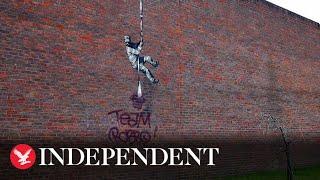 Banksy artwork on Reading Prison defaced with rival’s name