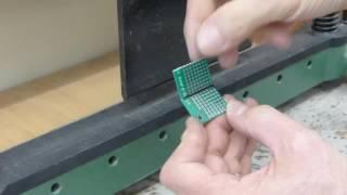 Cutting (actually, breaking) PCBs to size