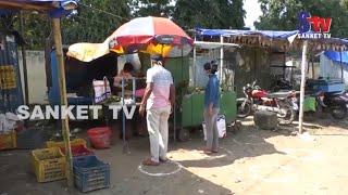 Odisha : Social distancing: Circles, squares drawn outside Balasore shops | Sanket Tv