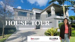 Home Touring a Luxury Property in Boca Raton Fl