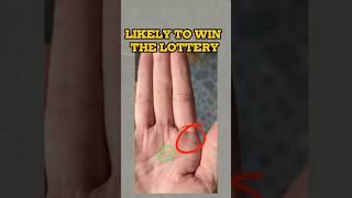 A cross sign indicating sudden wealth #palmistry #astrology #shortvideo