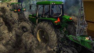 Towing John Deere 6910 out of the mud using winch