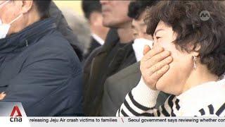 Jeju Air crash: Families camp at airport to wait for victims' remains