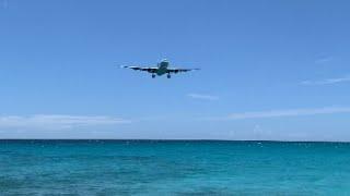 Aircraft landing at Princess Juliana International Airport, Maho Beach, Sint Maarten || WooGlobe