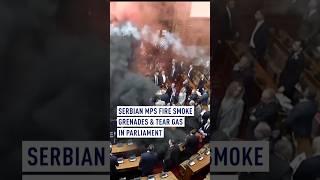 Serbian MPs fire smoke grenades and tear gas in parliament